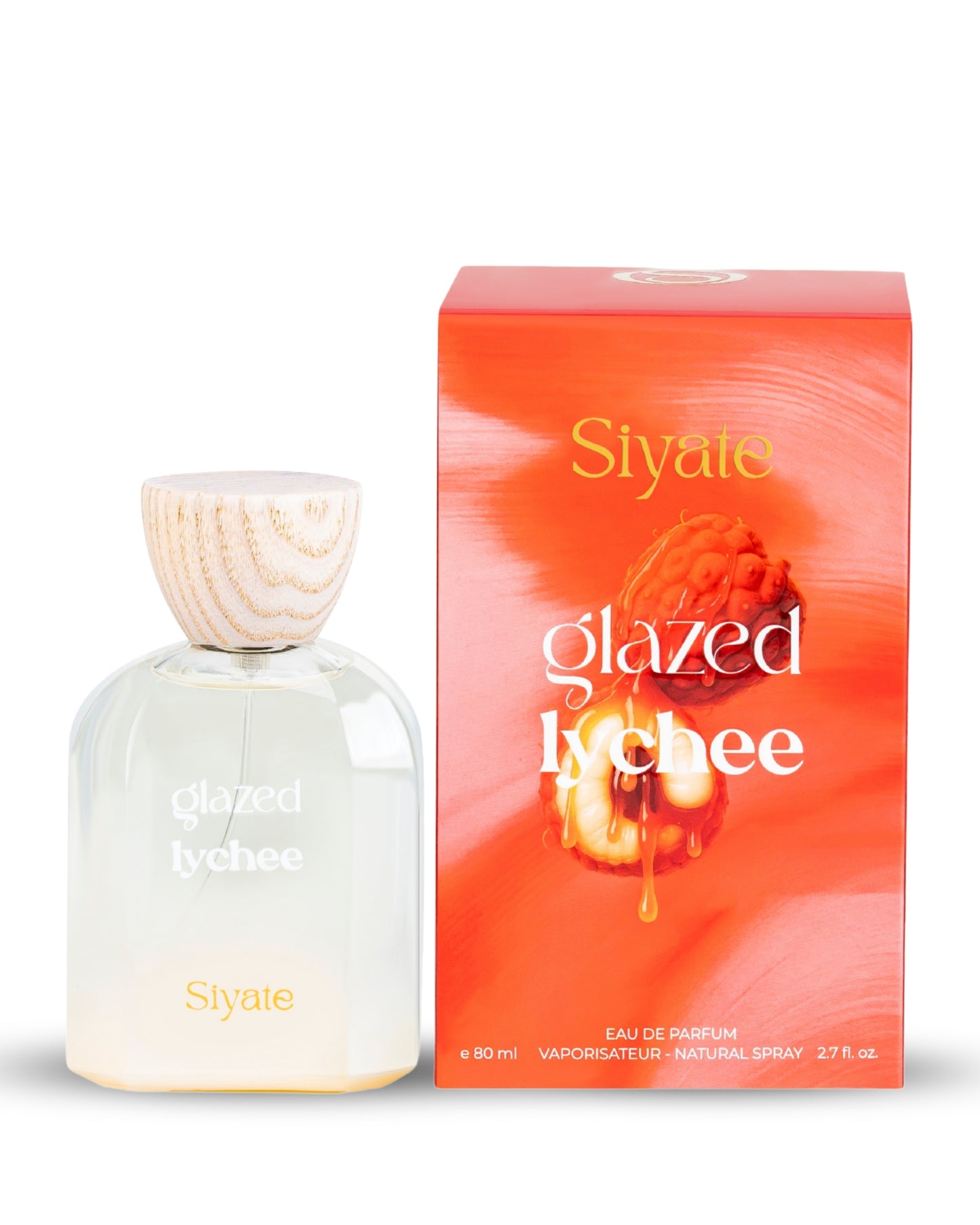 Siyate Glazed Lychee Eau de Parfum bottle next to its orange and red packaging box, featuring a graphic of a glazed lychee fruit.